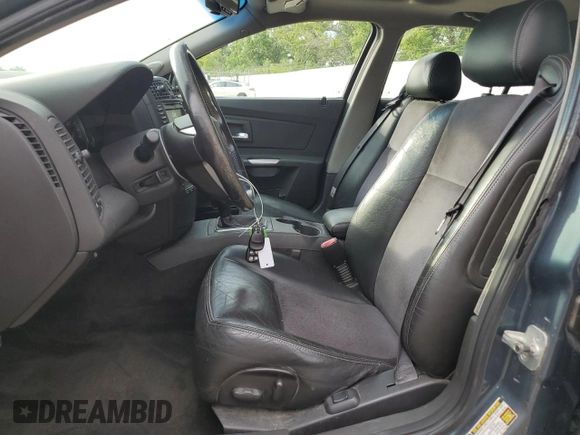2005 Cadillac CTS-V z VIN 1G6DN56S050178705, wystawiony jako Copart lot #59479084 z przebiegiem 197 725 mil mil oraz Szkoda całkowita • Salvage title. Historia ofert i sprzedaży dostępna na DreamBid. Obrazek 7.