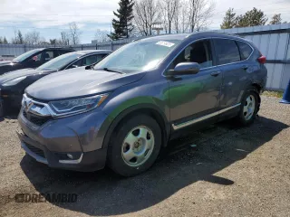 2019 Honda CR-V Touring with VIN 2HKRW2H90KH149664, listed as a Copart auction lot 52019525 with 147,649 mi miles and Salvage Title. Bid and sale history available at carsss.com. Image 1.
