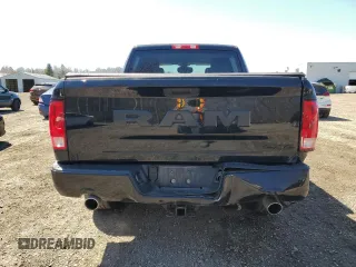 2021 Ram 1500 Tradesman z VIN 3C6RR7KT4MG693581, wystawiony jako Copart lot #53489595 z przebiegiem 96 693 mil mil oraz Szkoda całkowita • Salvage title. Historia ofert i sprzedaży dostępna na DreamBid. Obrazek 6.