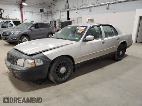 2008 Mercury Grand Marquis LS z VIN 2MEHM75V68X635918, wystawiony jako Copart lot #52676235 z przebiegiem 153 040 mil mil oraz Szkody całkowita. Historia ofert i sprzedaży dostępna na DreamBid. Obrazek 1.