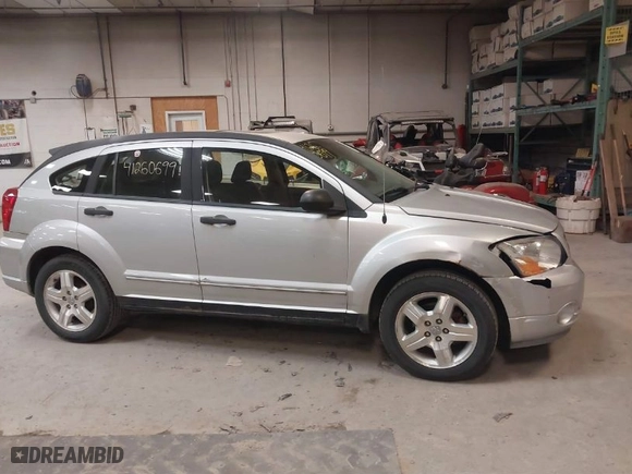 2007 Dodge Caliber SXT with VIN 1B3HB48B07D513778, listed as a IAAI auction lot 41260699 with NaN miles. Bid and sale history available at carsss.com. Image 19.