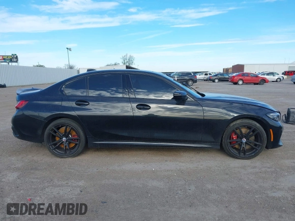 2022 BMW 3 Series M340i xDrive with VIN WBA5U9C08NFM68599, listed as a IAAI auction lot 41260340 with Not Provided miles and . Bid and sale history available at DreamBid. Image 13.