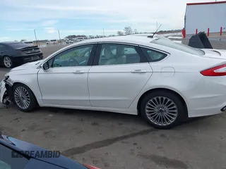 2015 Ford Fusion Titanium with VIN 3FA6P0D96FR192778, listed as a IAAI auction lot 41643030 with 141,805 mi miles. Bid and sale history available at carsss.com. Image 15.
