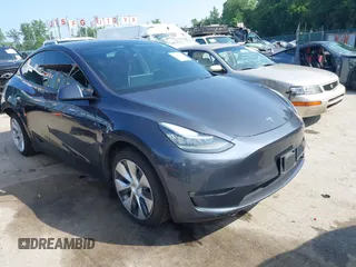 2021 Tesla Model Y Long Range z VIN 5YJYGAEE7MF146315, wystawiony jako IAAI lot #42445336 z przebiegiem 57 110 mil mil oraz . Historia ofert i sprzedaży dostępna na DreamBid. Obrazek 1.