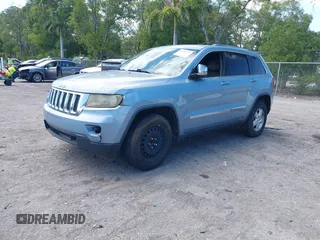 2013 Jeep Grand Cherokee Laredo with VIN 1C4RJEAG2DC517303, listed as a IAAI auction lot 42040405 with 222,952 mi miles. Bid and sale history available at carsss.com. Image 17.