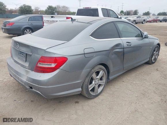 2012 Mercedes-Benz C-Class C 250 with VIN WDDGJ4HB6CF864731, listed as a IAAI auction lot 41177482 with 134,642 mi miles. Bid and sale history available at carsss.com. Image 4.