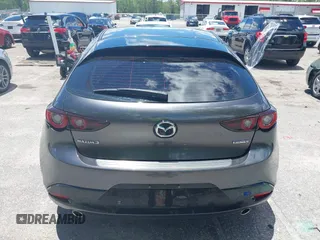 2022 Mazda 3 Select z VIN JM1BPAKL1N1519383, wystawiony jako IAAI lot #39742243 z przebiegiem 20 080 mil mil oraz . Historia ofert i sprzedaży dostępna na DreamBid. Obrazek 16.