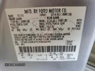 2012 Ford Escape Hybrid with VIN 1FMCU5K37CKB42310, listed as a Copart auction lot 67651144 with 154,852 mi miles and Salvage title. Bid and sale history available at DreamBid. Image 14.