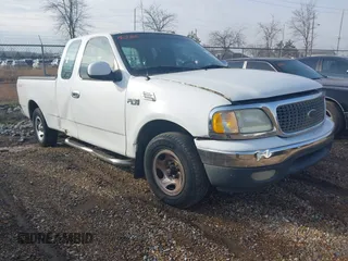 2000 Ford F-150 XL with VIN 1FTZX1729YNC01295, listed as a IAAI auction lot 41298499 with 1 mi miles. Bid and sale history available at carsss.com. Image 1.