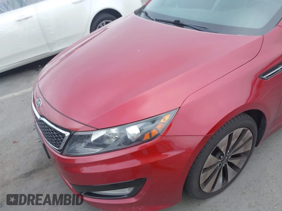 2012 Kia Optima SX z VIN 5XXGR4A64CG019121, wystawiony jako IAAI lot #42426482 z przebiegiem 137 496 mil mil oraz . Historia ofert i sprzedaży dostępna na DreamBid. Obrazek 6.