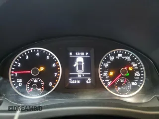 2017 Volkswagen Tiguan Sport z VIN WVGUV7AXXHK007234, wystawiony jako Copart lot #60206065 z przebiegiem 133 316 mil mil oraz Szkoda całkowita • Salvage title. Historia ofert i sprzedaży dostępna na DreamBid. Obrazek 9.