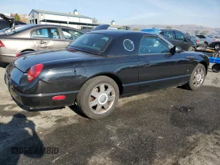 2004 Ford Thunderbird Deluxe with VIN 1FAHP60AX4Y104244, listed as a Copart auction lot 84561114 with 79,379 mi miles and Clean Title. Bid and sale history available at DreamBid. Image 3.