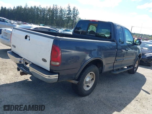 2001 Ford F-150 XL with VIN 1FTRX18L11NA30541, listed as a IAAI auction lot 42143117 with 187,855 mi miles. Bid and sale history available at carsss.com. Image 4.