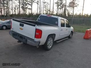 2012 Chevrolet Silverado 1500 LT with VIN 3GCPCSE07CG115883, listed as a IAAI auction lot 41722178 with 217,797 mi miles. Bid and sale history available at carsss.com. Image 4.