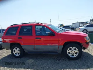 1999 Jeep Grand Cherokee Laredo with VIN 1J4GW58S5XC644757, listed as a IAAI auction lot 42139920 with 192,745 mi miles and . Bid and sale history available at DreamBid. Image 14.
