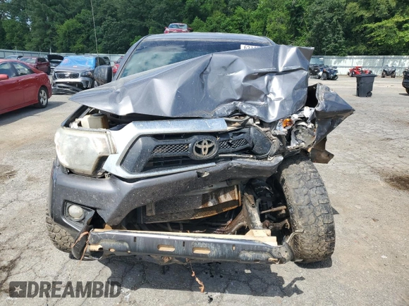 2014 Toyota Tacoma with VIN 5TFMU4FN3EX025697, listed as a Copart auction lot 62146895 with 133,028 mi miles and Salvage title. Bid and sale history available at DreamBid. Image 5.