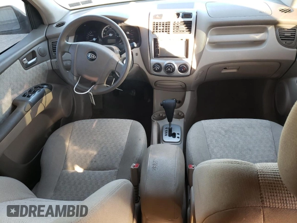 2005 Kia Sportage LX with VIN KNDJE723X57054667, listed as a Copart auction lot 77134794 with 159,748 mi miles and Salvage Title. Bid and sale history available at carsss.com. Image 8.