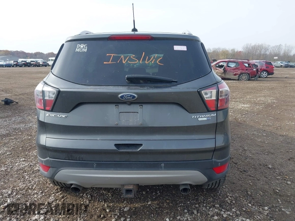 2017 Ford Escape Titanium with VIN 1FMCU9J98HUA49434, listed as a IAAI auction lot 40710866 with 143,850 mi miles. Bid and sale history available at carsss.com. Image 16.