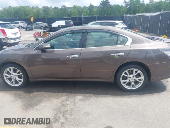 2014 Nissan Maxima S with VIN 1N4AA5AP9EC430843, listed as a IAAI auction lot 42104446 with 159,256 mi miles and . Bid and sale history available at DreamBid. Image 14.