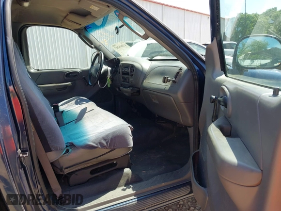 2003 Ford F-150 XL with VIN 1FTRF17283KA21397, listed as a IAAI auction lot 42069287 with 184,014 mi miles and . Bid and sale history available at DreamBid. Image 5.