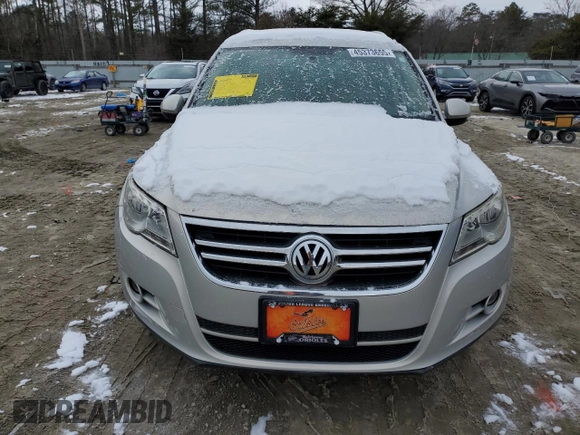 2010 Volkswagen Tiguan with VIN WVGAV9AX7AW514556, listed as a Copart auction lot 45373655 with 94,751 mi miles and Salvage Title. Bid and sale history available at DreamBid. Image 5.