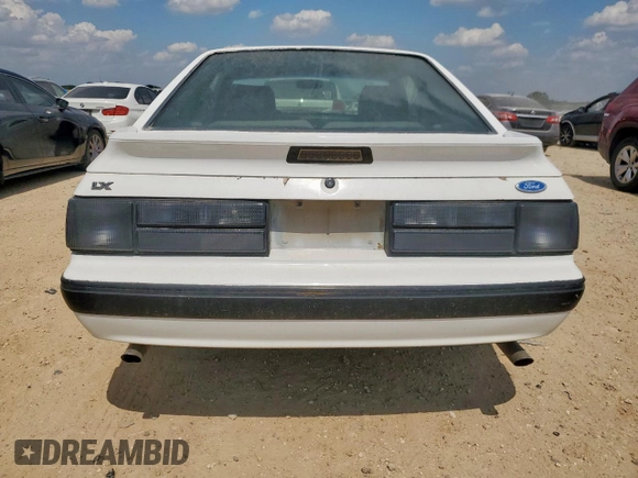1989 Ford Mustang with VIN 1FABP41E3KF176536, listed as a Copart auction lot 58233075 with 17,202 mi miles and Salvage title. Bid and sale history available at DreamBid. Image 6.