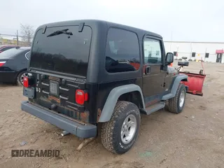 2006 Jeep Wrangler Sport with VIN 1J4FA49S66P746787, listed as a IAAI auction lot 41537730 with 97,365 mi miles. Bid and sale history available at carsss.com. Image 4.
