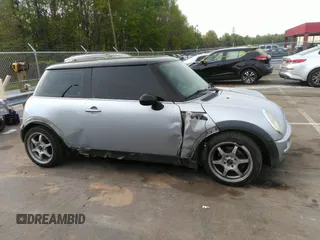 2002 MINI Hardtop with VIN WMWRC33432TE10226, listed as a IAAI auction lot 41973956 with 156,445 mi miles and . Bid and sale history available at DreamBid. Image 13.