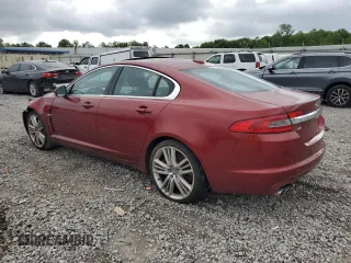 2010 Jaguar XF Supercharged with VIN SAJWA0HE1AMR74203, listed as a Copart auction lot 64029824 with 128,676 mi miles and Salvage Title. Bid and sale history available at carsss.com. Image 2.