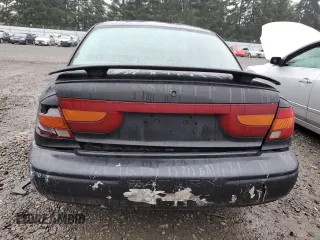 2000 Saturn SL with VIN 1G8ZK5270YZ269898, listed as a Copart auction lot 88082365 with 124,233 mi miles and Salvage title. Bid and sale history available at DreamBid. Image 6.