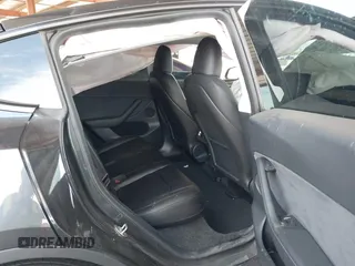 2024 Tesla Model Y with VIN 7SAYGDED9RF053203, listed as a IAAI auction lot 41906729 with Not Provided miles and . Bid and sale history available at DreamBid. Image 8.