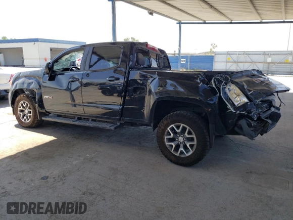 2021 GMC Canyon 4WD AT4 w/Cloth with VIN 1GTG6FEN0M1273816, listed as a Copart auction lot 65976804 with 28,082 mi miles and Salvage Title. Bid and sale history available at carsss.com. Image 2.