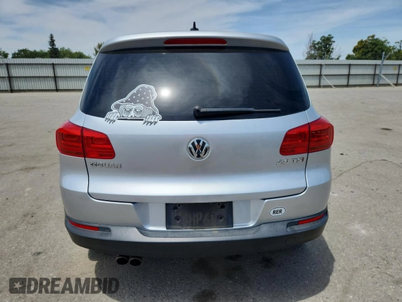 2014 Volkswagen Tiguan SE with VIN WVGAV3AX3EW590861, listed as a Copart auction lot 58517535 with 68,481 mi miles and Salvage title. Bid and sale history available at DreamBid. Image 6.