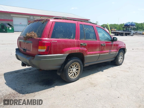 2001 Jeep Grand Cherokee Laredo z VIN 1J4GW48S11C720055, wystawiony jako IAAI lot #42453532 z przebiegiem 158 486 mil mil oraz . Historia ofert i sprzedaży dostępna na DreamBid. Obrazek 4.