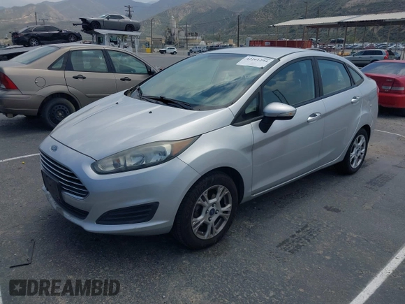 2016 Ford Fiesta SE with VIN 3FADP4BJ6GM122174, listed as a IAAI auction lot 42161294 with 138,090 mi miles. Bid and sale history available at carsss.com. Image 2.