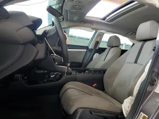 2017 Honda Civic LX with VIN 19XFC2F56HE206118, listed as a Copart auction lot 58777885 with 59,710 mi miles and Salvage title. Bid and sale history available at DreamBid. Image 7.