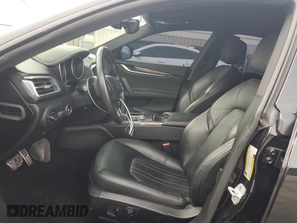 2019 Maserati Ghibli с VIN ZAM57XSA3K1311169, выставлен на аукционе Copart как лот 49583325 с пробегом 66 290 миль миль и Списание • Salvage title. История ставок и продаж доступна на DreamBid. Изображение 7.
