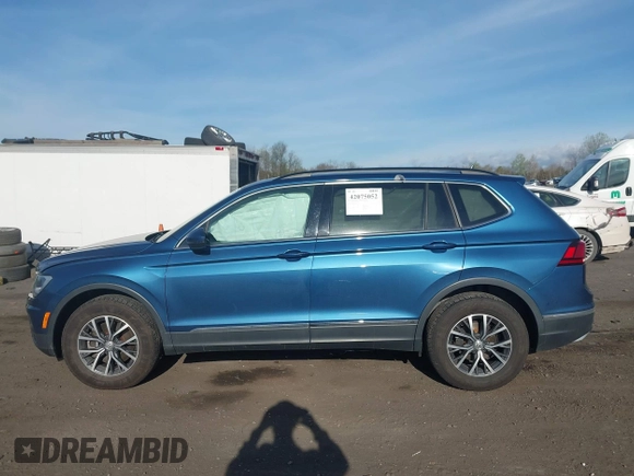 2020 Volkswagen Tiguan SE with VIN 3VV2B7AX2LM017277, listed as a IAAI auction lot 42075052 with 72,248 mi miles and . Bid and sale history available at DreamBid. Image 14.