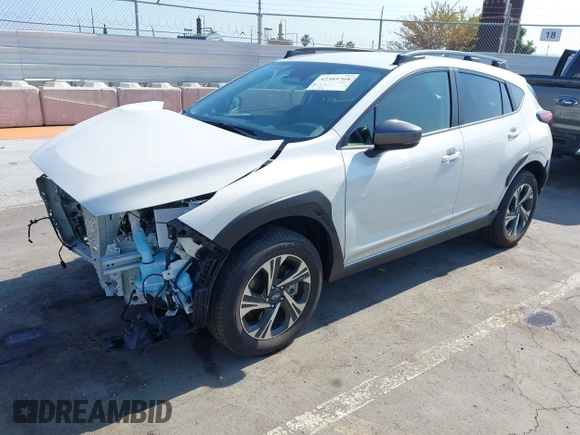 2024 Subaru Crosstrek Premium z VIN JF2GUADC2R8336410, wystawiony jako IAAI lot #42385768 z przebiegiem 22 126 mil mil oraz . Historia ofert i sprzedaży dostępna na DreamBid. Obrazek 2.