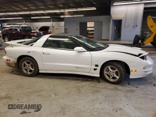 2000 Pontiac Firebird Formula z VIN 2G2FV22GXY2112840, wystawiony jako Copart lot #76244634 z przebiegiem 105 197 mil mil oraz Czysty tytuł • Clean title. Historia ofert i sprzedaży dostępna na DreamBid. Obrazek 4.
