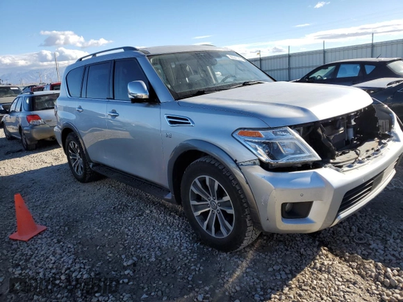 2018 Nissan Armada SL z VIN JN8AY2NC2J9556940, wystawiony jako Copart lot #85341904 z przebiegiem 133 725 mil mil oraz Szkoda całkowita • Salvage title. Historia ofert i sprzedaży dostępna na DreamBid. Obrazek 4.