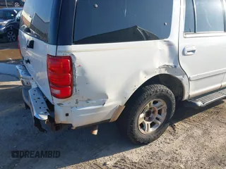 1999 Ford Expedition XLT with VIN 1FMRU1761XLA56030, listed as a IAAI auction lot 42703533 with Not provided miles and . Bid and sale history available at DreamBid. Image 13.