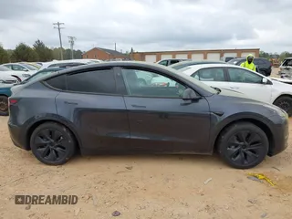 2024 Tesla Model Y with VIN 7SAYGDED3RA303113, listed as a IAAI auction lot 41915760 with 12,917 mi miles and . Bid and sale history available at DreamBid. Image 12.