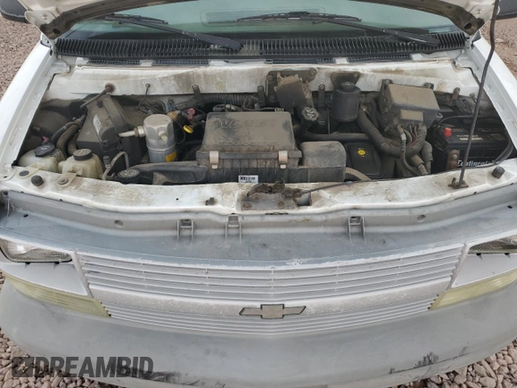 2004 Chevrolet Astro Cargo z VIN 1GCDM19X24B107752, wystawiony jako Copart lot #86927524 z przebiegiem 292 965 mil mil oraz Szkoda całkowita • Salvage title. Historia ofert i sprzedaży dostępna na DreamBid. Obrazek 13.