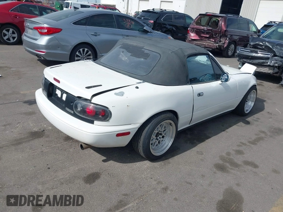 1992 Mazda MX-5 Miata with VIN JM1NA3513N0308521, listed as a IAAI auction lot 42225665 with 235,947 mi miles and . Bid and sale history available at DreamBid. Image 4.