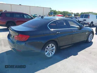 2015 BMW 5 Series 528i xDrive with VIN WBA5A7C58FG144069, listed as a IAAI auction lot 41854112 with 136,403 mi miles and . Bid and sale history available at DreamBid. Image 4.