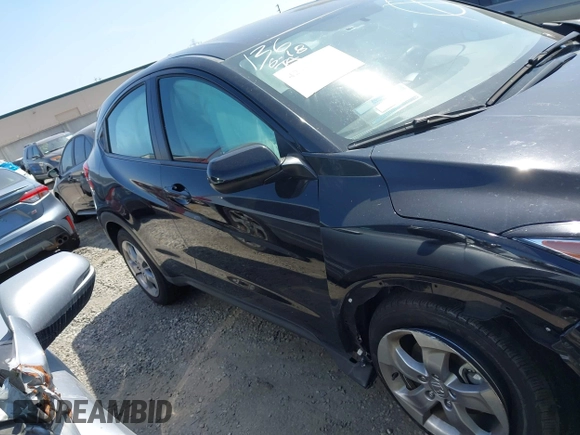 2021 Honda HR-V LX with VIN 3CZRU5H37MM704782, listed as a IAAI auction lot 42401214 with 41,822 mi miles and . Bid and sale history available at DreamBid. Image 14.
