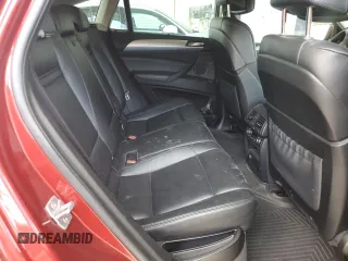 2014 BMW X6 50i z VIN 5UXFG8C58EL592408, wystawiony jako Copart lot #58175225 z przebiegiem 119 939 mil mil oraz Czysty tytuł • Clean title. Historia ofert i sprzedaży dostępna na DreamBid. Obrazek 11.