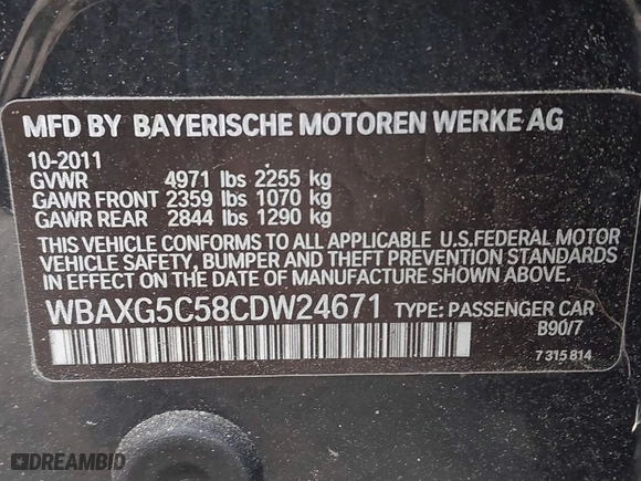 2012 BMW 5 Series 528i with VIN WBAXG5C58CDW24671, listed as a IAAI auction lot 41917583 with 167,098 mi miles. Bid and sale history available at carsss.com. Image 9.
