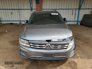 2018 Volkswagen Tiguan S with VIN 3VV1B7AXXJM054778, listed as a Copart auction lot 61294795 with 87,330 mi miles and Salvage title. Bid and sale history available at DreamBid. Image 5.